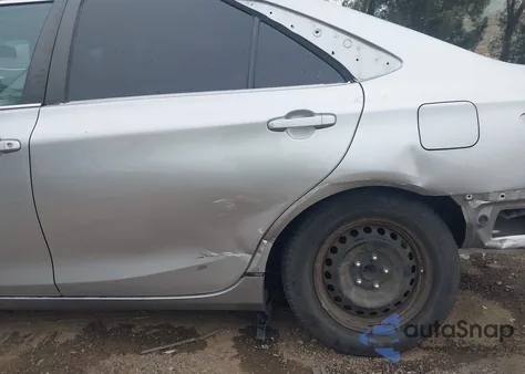 2015 Toyota Camry Le z USA, uszkodzony, nr VIN 4T4BF1FK7FR490087